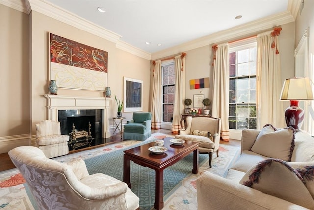 living room with light wood-type flooring, a premium fireplace, and crown molding