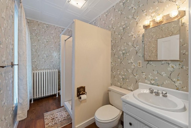 full bathroom featuring an ornate ceiling, a shower stall, radiator heating unit, and wallpapered walls