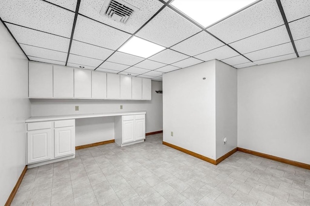 236 Williamsburg Dr, Longmeadow, MA 01106 - below grade area with baseboards and a paneled ceiling