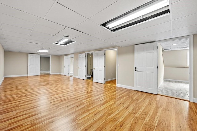 21 Nourse St, Westborough, MA 01581 - finished basement featuring light wood-style flooring and baseboards