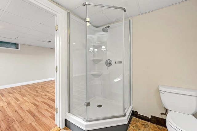 21 Nourse St, Westborough, MA 01581 - bathroom with a stall shower, toilet, baseboards, and wood finished floors