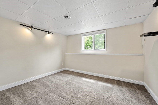 21 Nourse St, Westborough, MA 01581 - below grade area featuring carpet floors, baseboards, and a drop ceiling