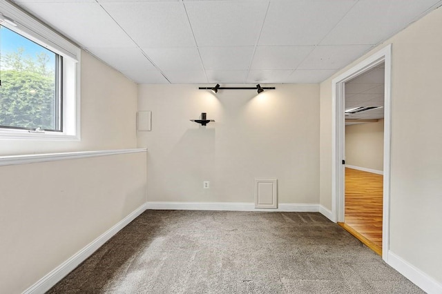 21 Nourse St, Westborough, MA 01581 - carpeted empty room with baseboards and a paneled ceiling