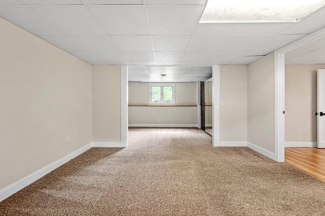 21 Nourse St, Westborough, MA 01581 - basement featuring carpet flooring, baseboards, and a drop ceiling