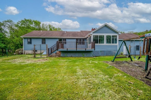21 Nourse St, Westborough, MA 01581 - back of house with a wooden deck, a yard, a sunroom, and a chimney