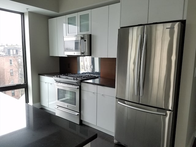 kitchen featuring white cabinetry and stainless steel appliances