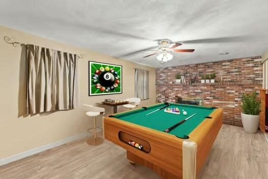 120 Hatchfield Dr, Brockton, MA 02301 - playroom featuring brick wall, wood finished floors, a ceiling fan, billiards table, and baseboards