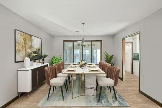 120 Hatchfield Dr, Brockton, MA 02301 - dining room featuring baseboards, light wood-style floors, and a chandelier