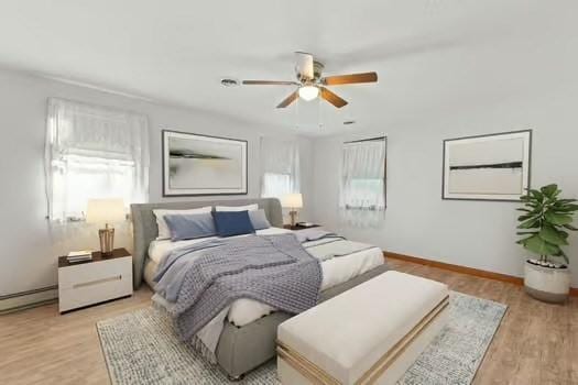 120 Hatchfield Dr, Brockton, MA 02301 - bedroom with multiple windows, light wood-style floors, baseboards, and a ceiling fan