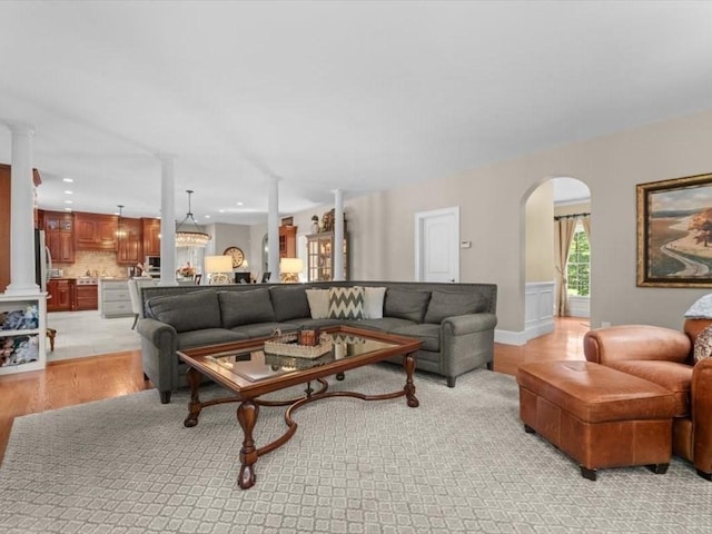 35 Oxbow Dr, Wrentham, MA 02093 - living room with arched walkways and light wood finished floors