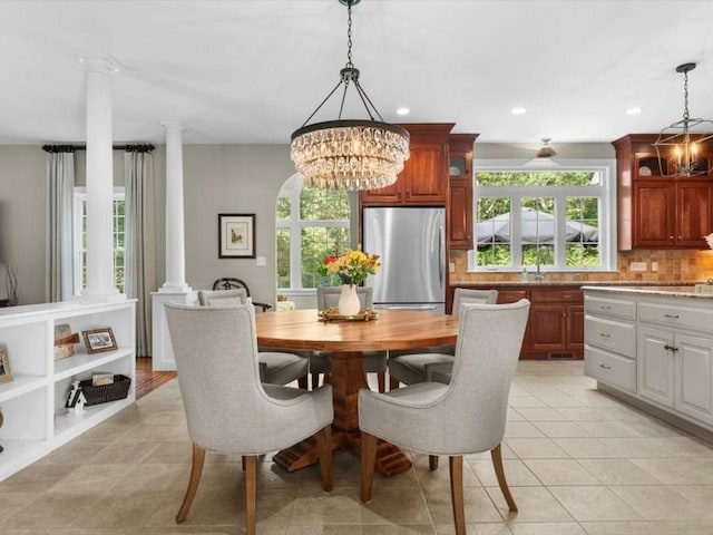 35 Oxbow Dr, Wrentham, MA 02093 - dining area featuring decorative columns, plenty of natural light, recessed lighting, a chandelier, and light tile patterned flooring