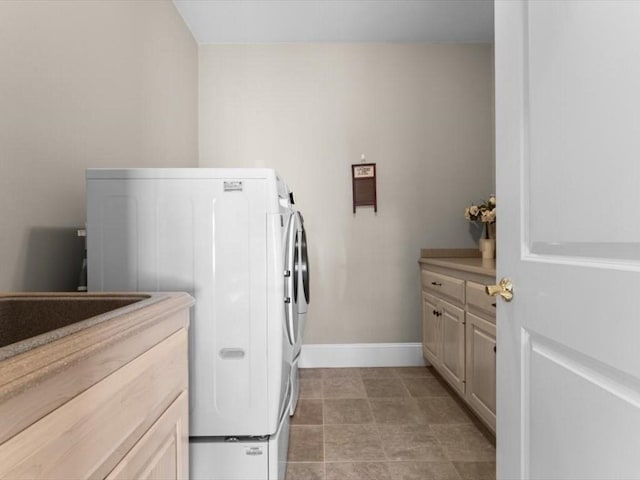 35 Oxbow Dr, Wrentham, MA 02093 - washroom with washer and dryer and cabinet space