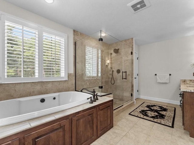 35 Oxbow Dr, Wrentham, MA 02093 - bathroom with vanity, a garden tub, a shower stall, and tile patterned floors