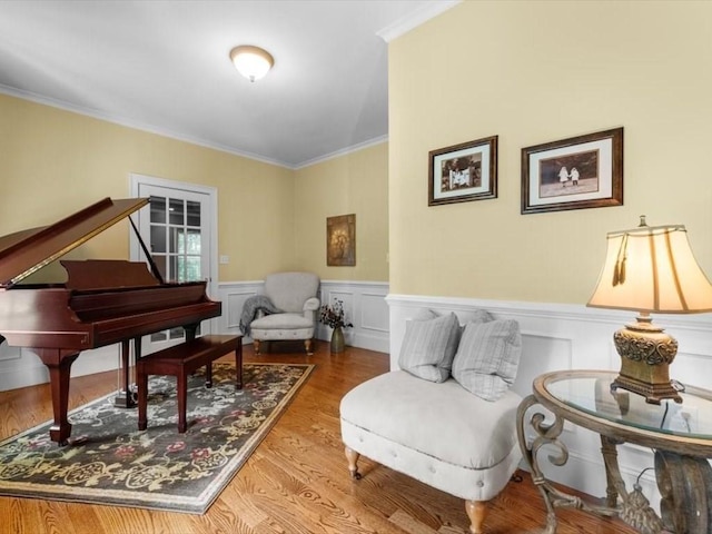 35 Oxbow Dr, Wrentham, MA 02093 - sitting room with crown molding, a wainscoted wall, and wood finished floors