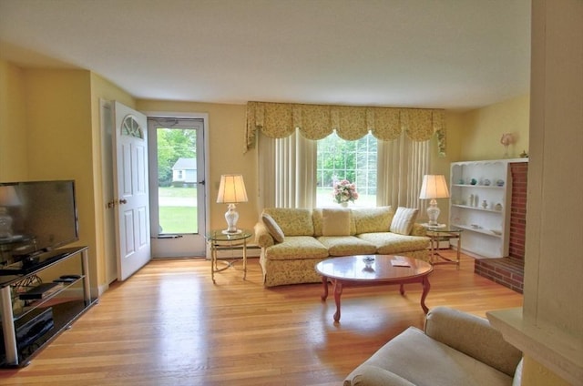 31 Lee Ave, Fitchburg, MA 01420 - living room with wood finished floors and a baseboard heating unit