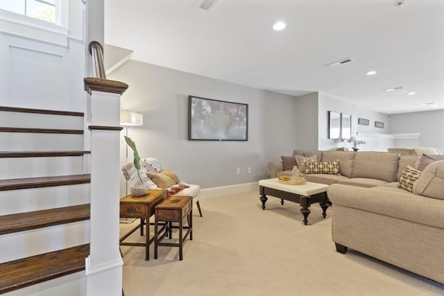 living room featuring light colored carpet