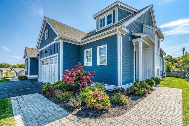 view of home's exterior featuring a garage