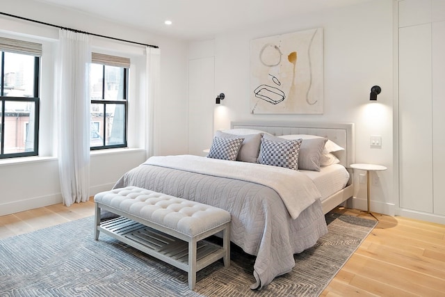 bedroom featuring light wood-type flooring