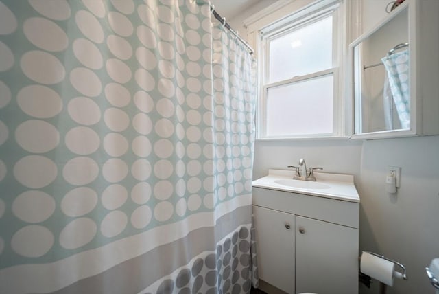 8 Ward St, Salem, MA 01970 - bathroom with vanity, plenty of natural light, and a shower with shower curtain
