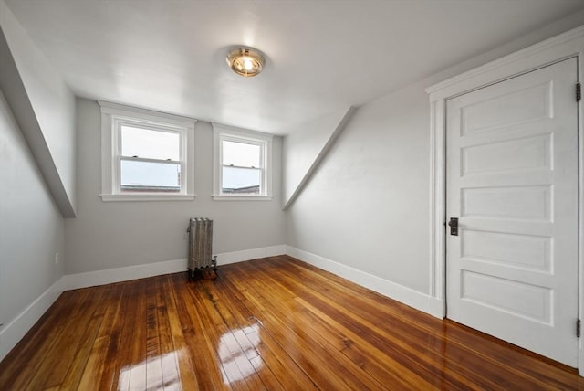 8 Ward St, Salem, MA 01970 - bonus room with radiator heating unit and hardwood / wood-style flooring