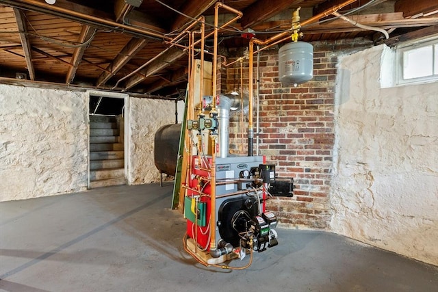 23 Lenox Cir, Lawrence, MA 01843 - basement featuring oil tank and a heating unit