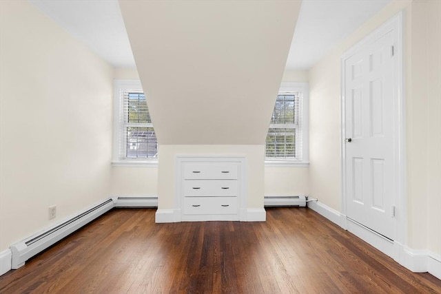 23 Lenox Cir, Lawrence, MA 01843 - additional living space with a baseboard radiator, wood finished floors, and baseboards