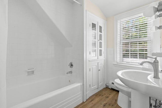 23 Lenox Cir, Lawrence, MA 01843 - full bath featuring wood finished floors, plenty of natural light, lofted ceiling, toilet, and shower / bathtub combination