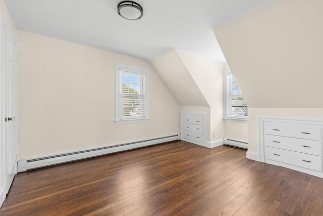 23 Lenox Cir, Lawrence, MA 01843 - bonus room with a baseboard radiator, baseboard heating, wood finished floors, lofted ceiling, and baseboards