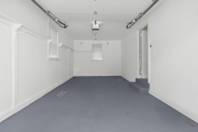 23 Lenox Cir, Lawrence, MA 01843 - garage featuring a garage door opener