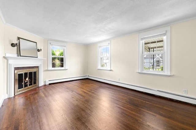 23 Lenox Cir, Lawrence, MA 01843 - unfurnished living room with a baseboard radiator, wood finished floors, ornamental molding, a fireplace with flush hearth, and a textured ceiling