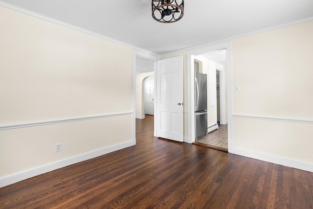 23 Lenox Cir, Lawrence, MA 01843 - unfurnished room with baseboards, dark wood-style flooring, a chandelier, and ornamental molding