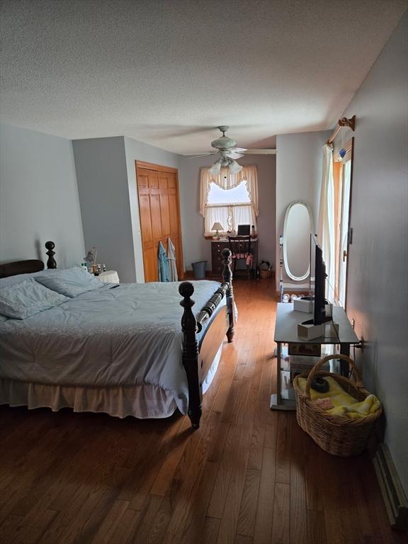 127 Parker Ln, Ludlow, MA 01056 - bedroom with wood-type flooring and a ceiling fan