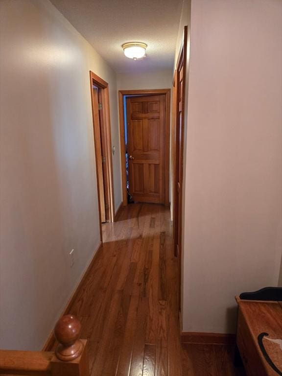 127 Parker Ln, Ludlow, MA 01056 - corridor featuring wood finished floors and baseboards