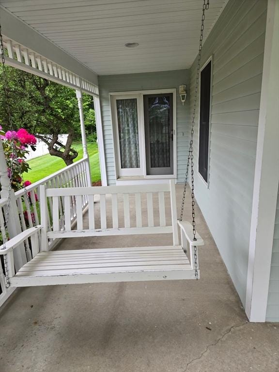 127 Parker Ln, Ludlow, MA 01056 - doorway to property featuring covered porch