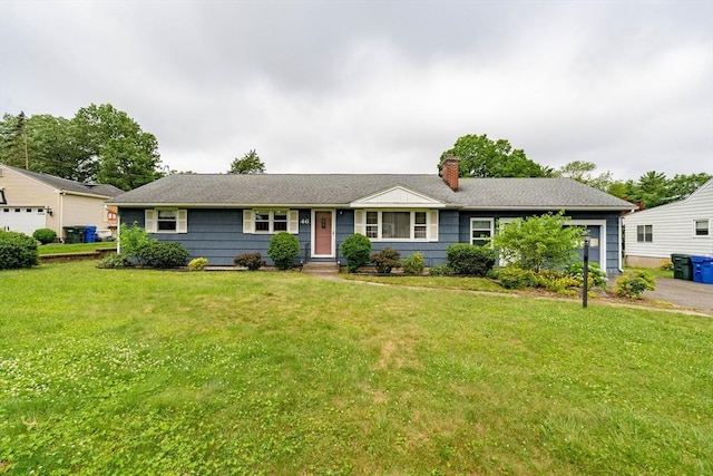 46 Birchland Ave, Springfield, MA 01119 - ranch-style home with a chimney, a front yard, and an attached garage