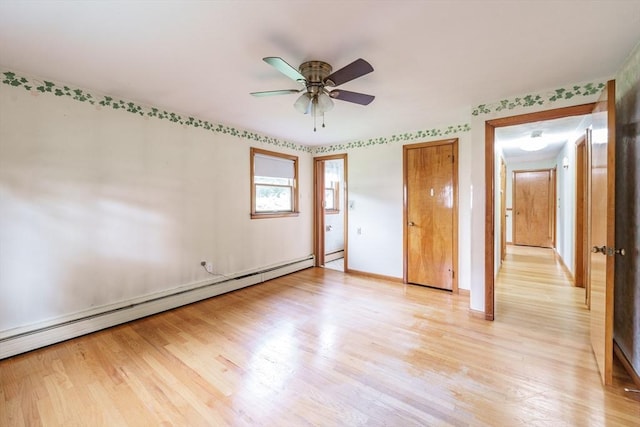 46 Birchland Ave, Springfield, MA 01119 - unfurnished bedroom with light wood-style flooring, baseboard heating, and a ceiling fan