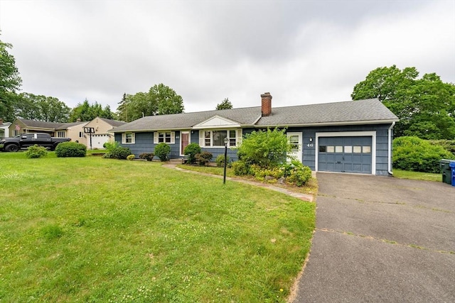 46 Birchland Ave, Springfield, MA 01119 - ranch-style house featuring a garage, a chimney, driveway, and a front lawn