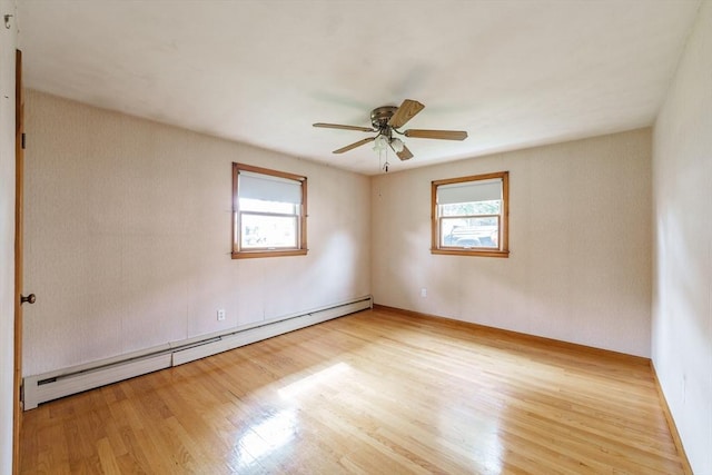 46 Birchland Ave, Springfield, MA 01119 - unfurnished room with baseboard heating, plenty of natural light, wood finished floors, and ceiling fan