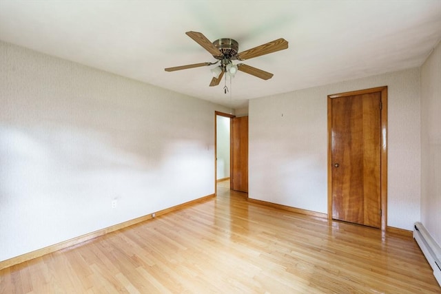 46 Birchland Ave, Springfield, MA 01119 - unfurnished bedroom with a baseboard heating unit, light wood-style flooring, and ceiling fan