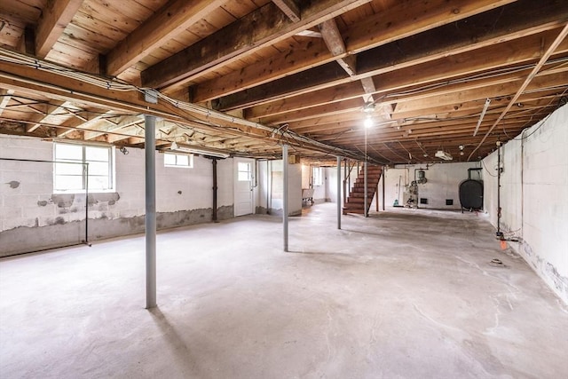 46 Birchland Ave, Springfield, MA 01119 - below grade area featuring stairs, plenty of natural light, and heating fuel