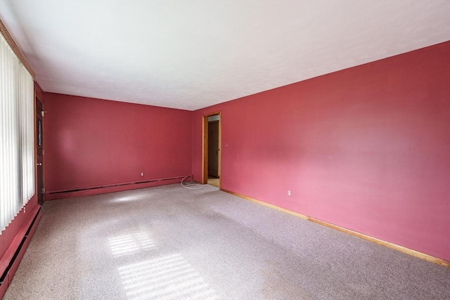 46 Birchland Ave, Springfield, MA 01119 - spare room with carpet floors, a baseboard heating unit, and a baseboard radiator