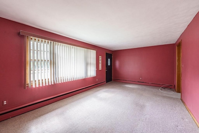 46 Birchland Ave, Springfield, MA 01119 - spare room featuring baseboard heating and carpet flooring
