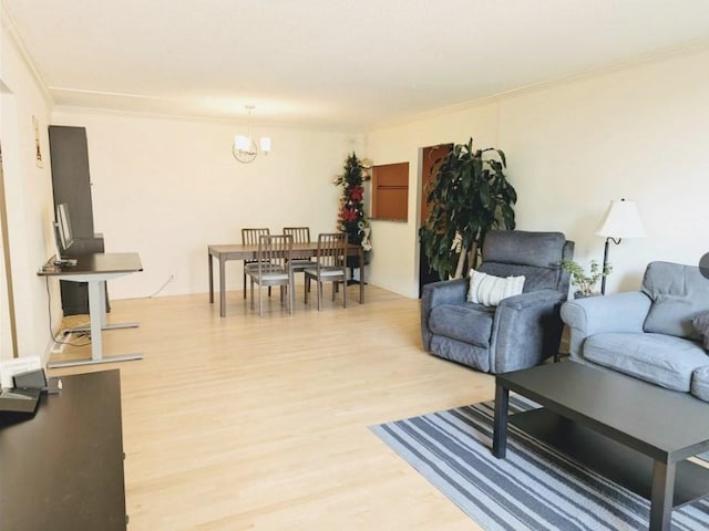 99 Pond Ave Unit 608, Brookline, MA 02445 - living room with light wood-style flooring, crown molding, and a chandelier