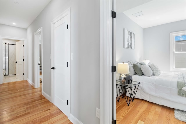 bedroom featuring light hardwood / wood-style floors