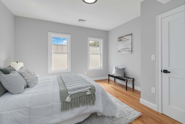 bedroom featuring wood-type flooring