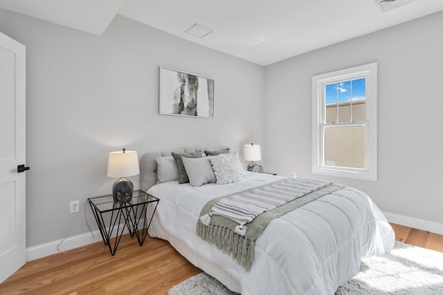 bedroom featuring hardwood / wood-style floors