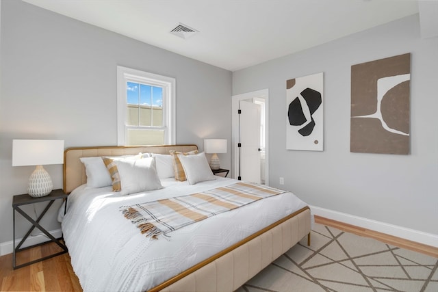 bedroom featuring light hardwood / wood-style flooring