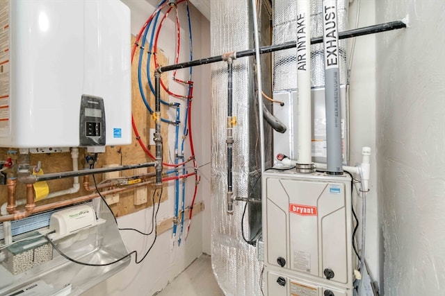 utility room featuring tankless water heater