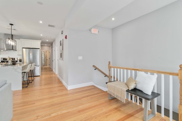 hallway featuring light hardwood / wood-style floors