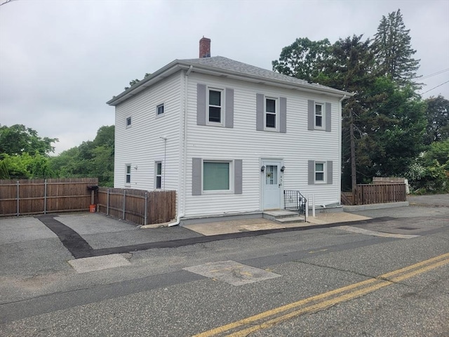 436 Brown St, Attleboro, MA 02703 - view of front facade with a chimney